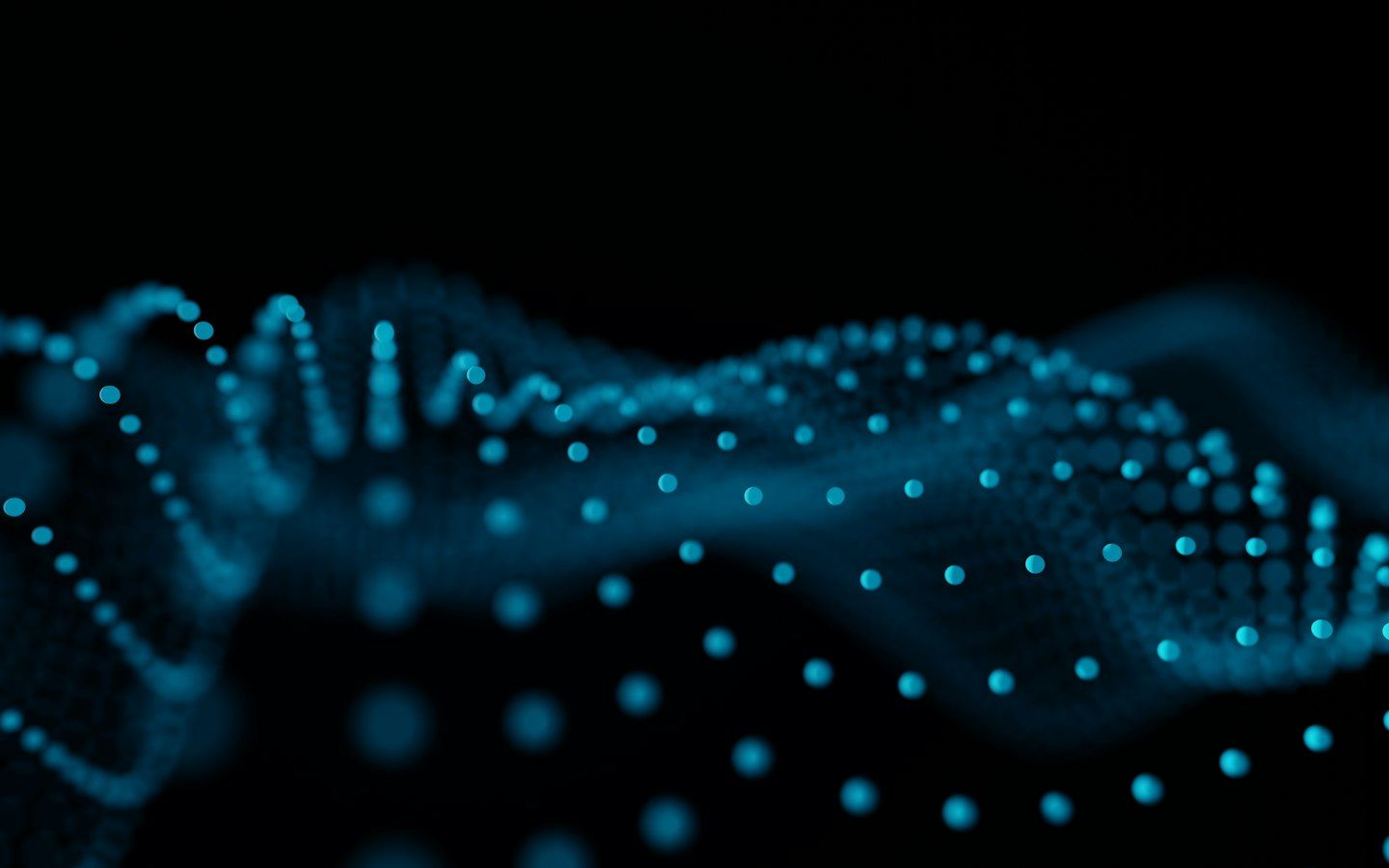 Glowing dots forming wave patterns